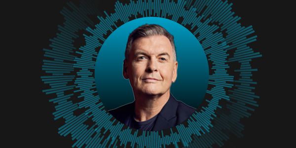 A portrait of a man centered within a circular frame against a dark background, surrounded by a ring of teal soundwave graphics.