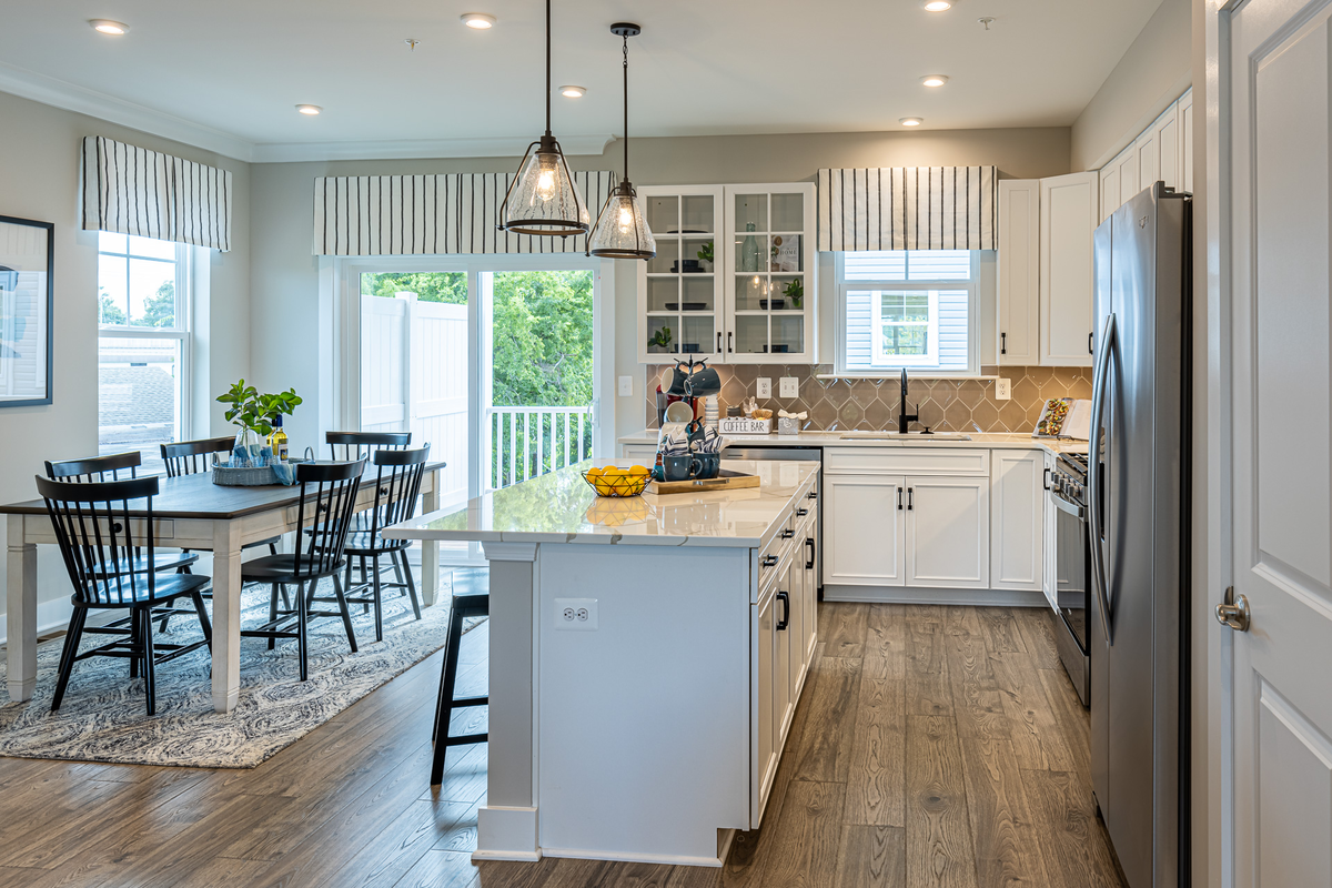 kitchen and breakfast area with designer floors