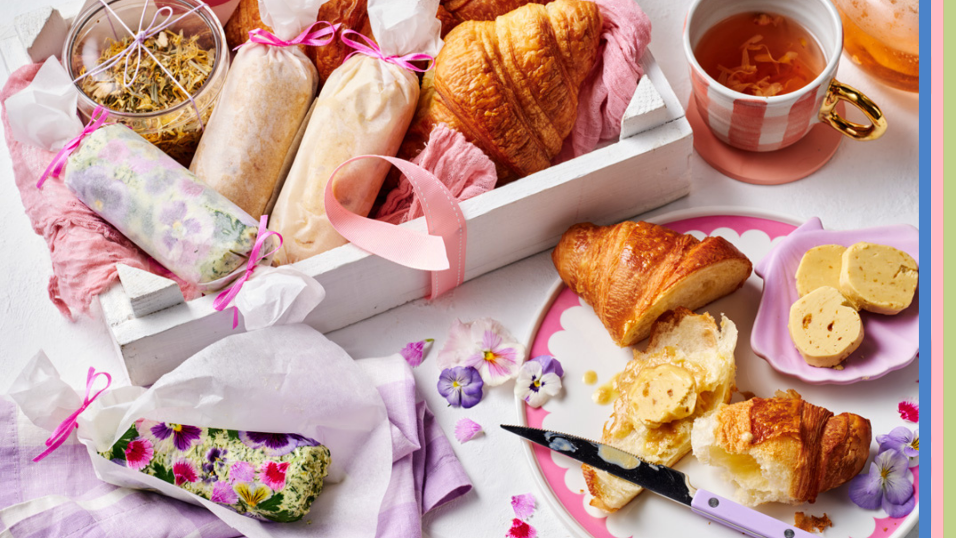 Freshly brewed tea in a glass pot served with croissant and home made butters for Mother's Day.
