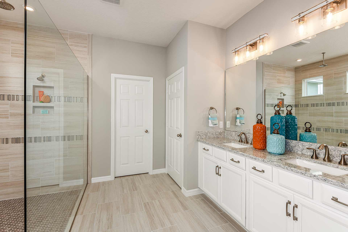 primary bathroom with enlarged tile shower