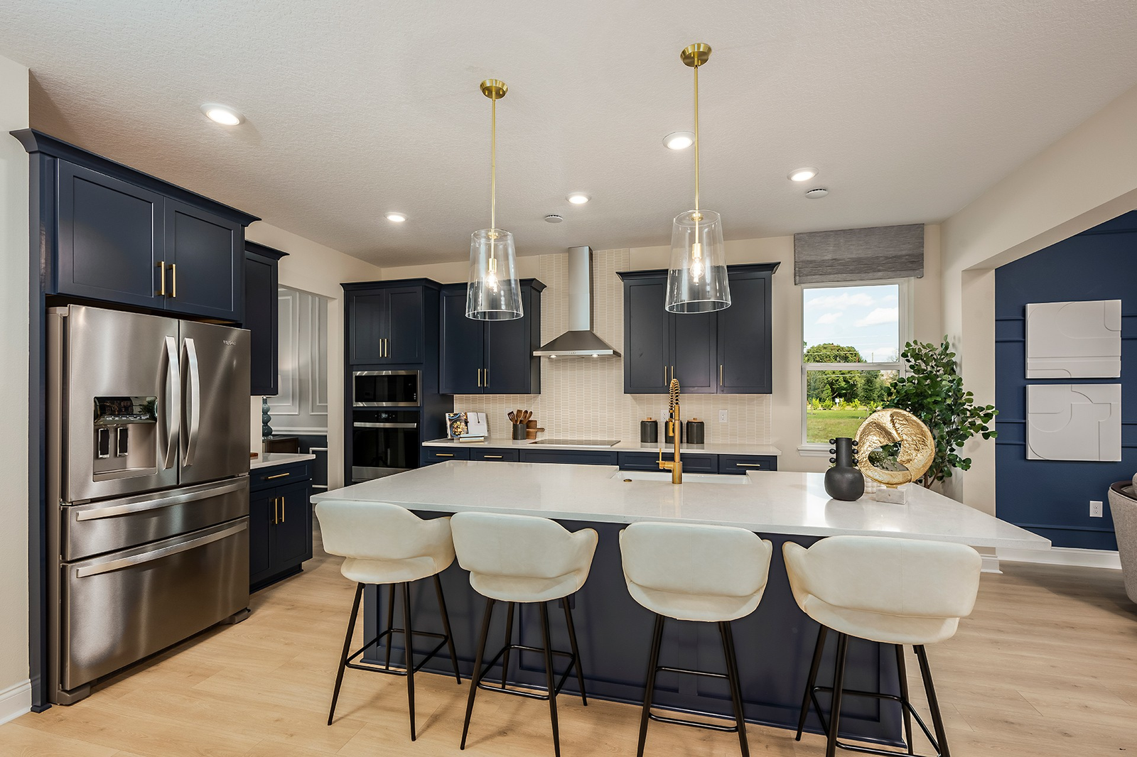 kitchen with center island and view of great room