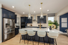 kitchen with center island and view of great room