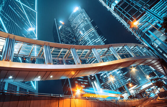 Futuristic city buildings at night