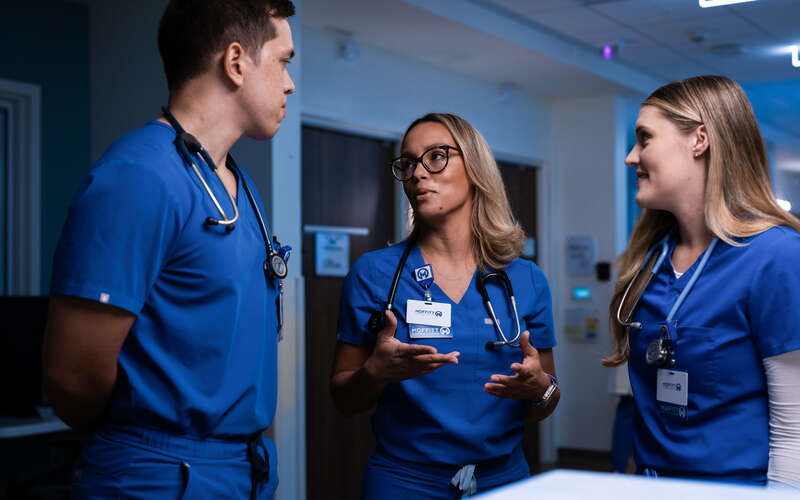 Nursing team members meet 