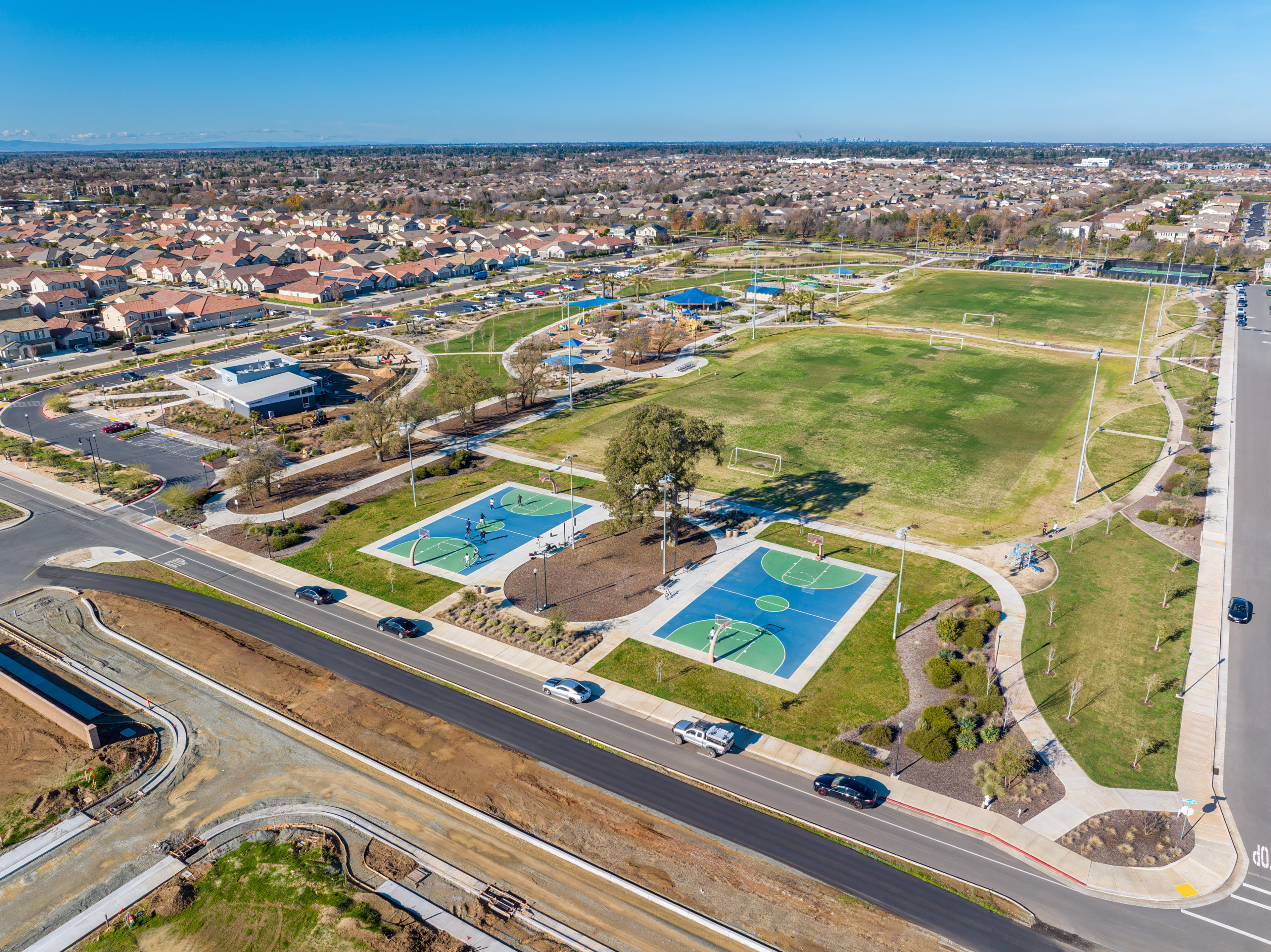 park with two basketball courts and soccer fields