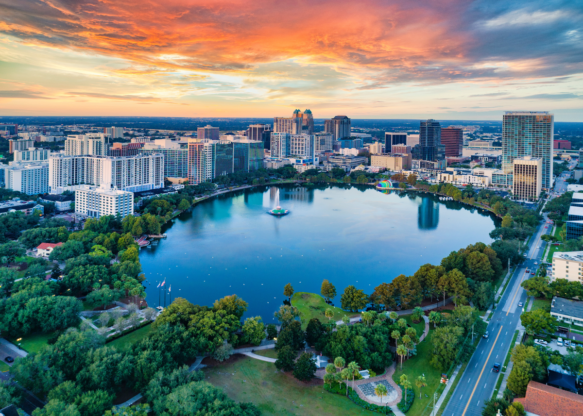 aerial image of downtown orlando with lake in the center