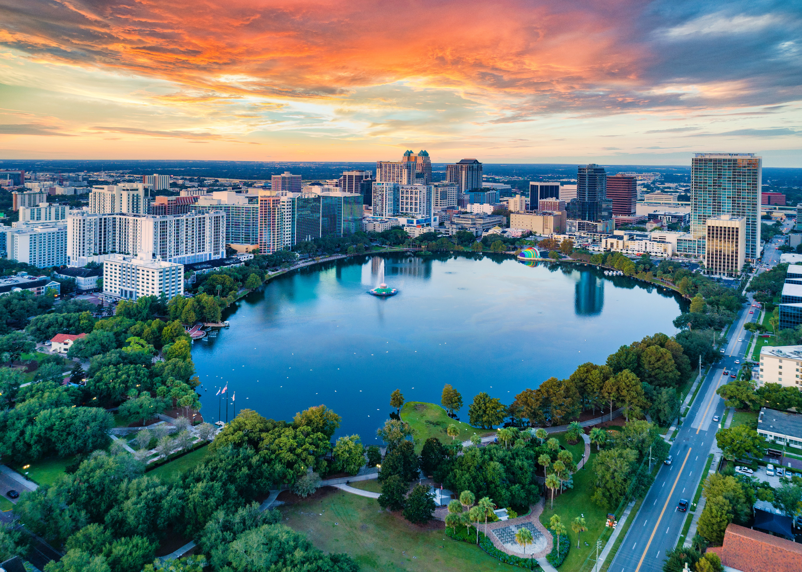 aerial image of downtown orlando with lake in the center