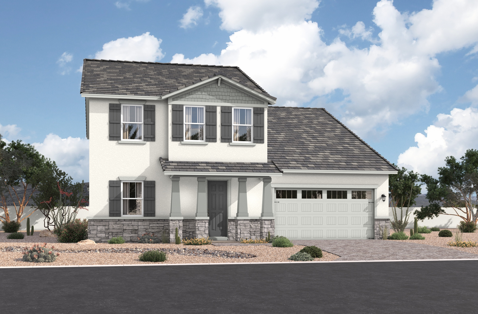 two-story home with desert landscaping