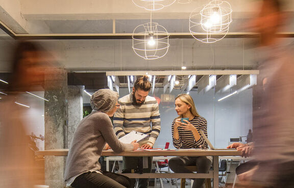 Long exposure of people in a meeting room