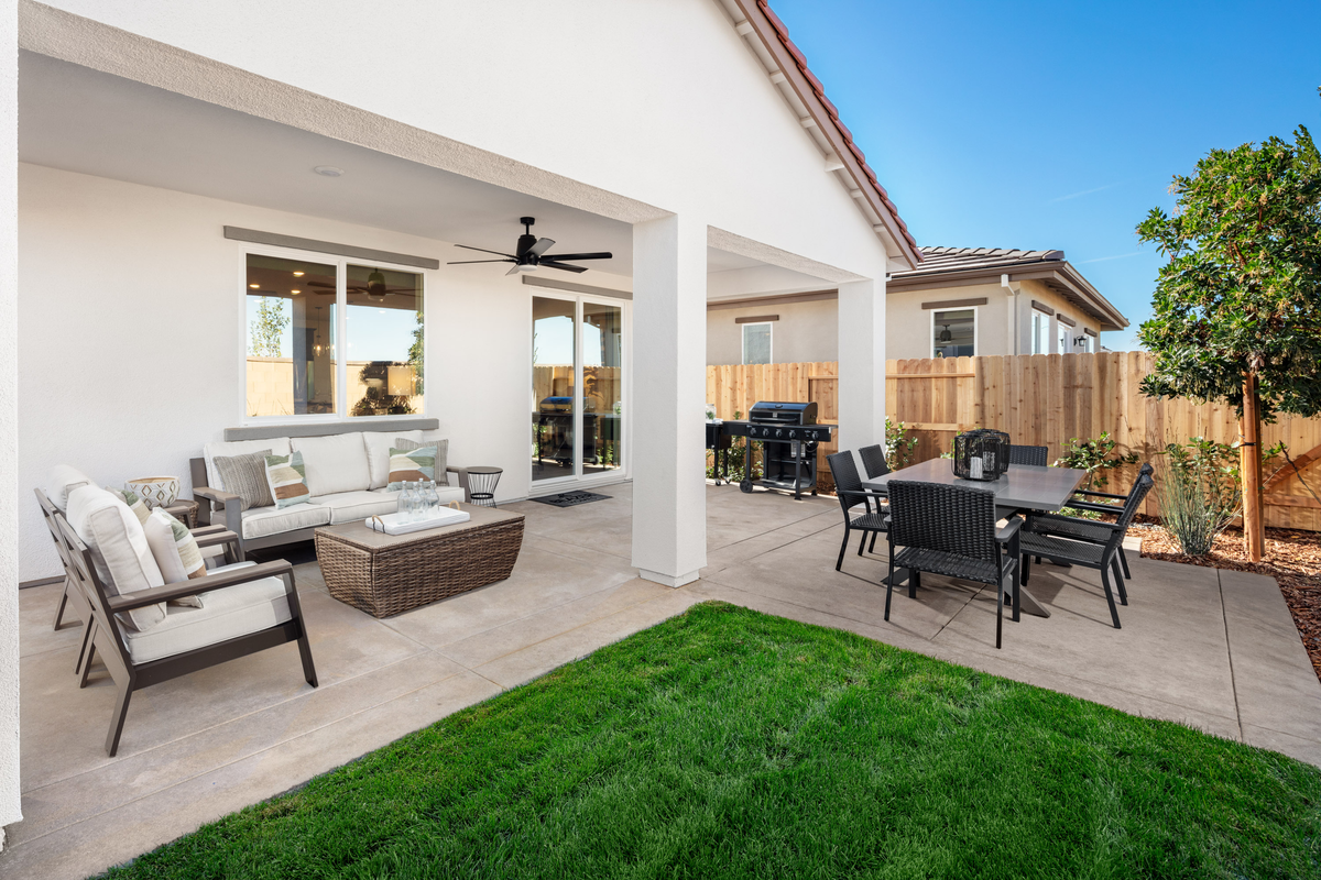 backyard with outdoor furniture and barbecue