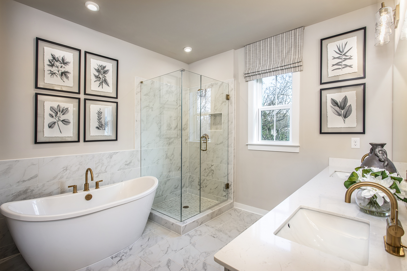 primary bathroom with free-standing tub and separate shower
