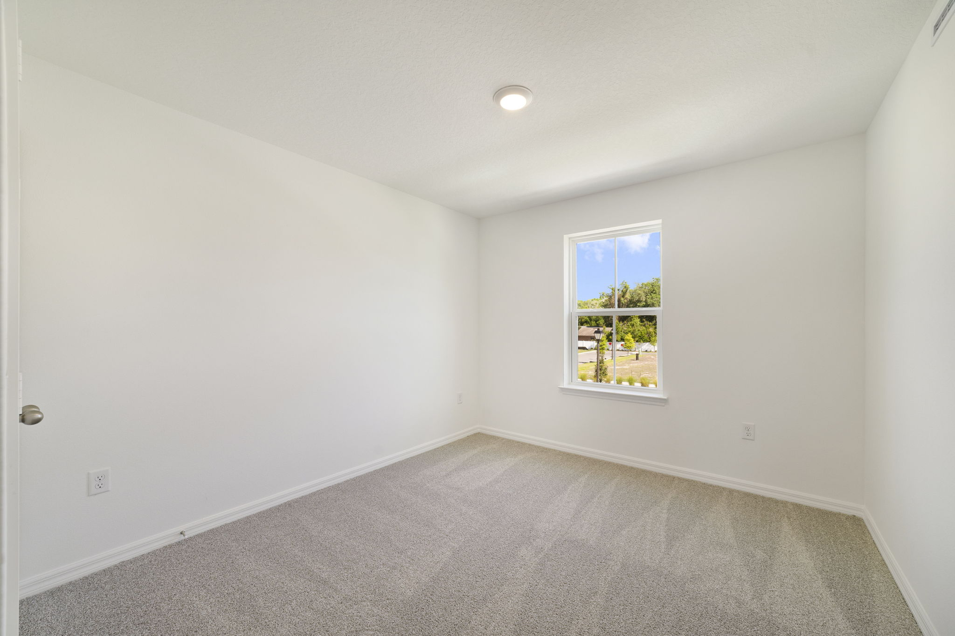 carpet throughout with a closet and a single window
