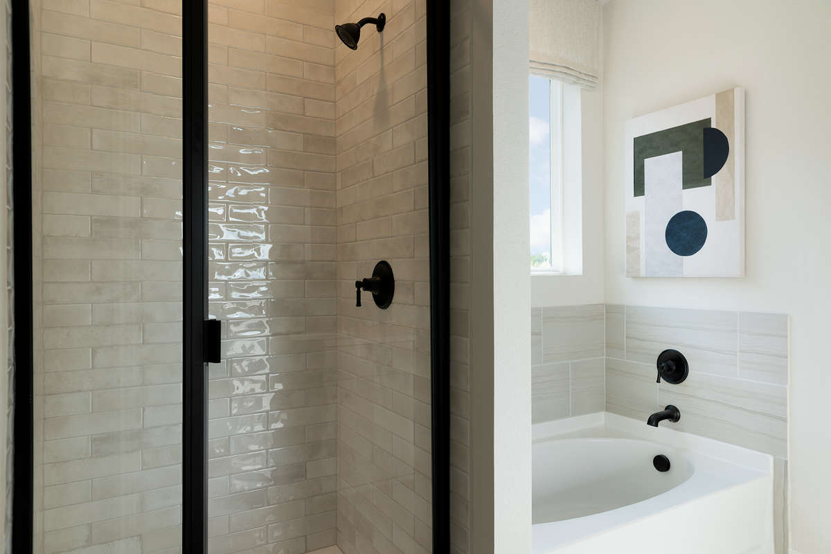 bathroom with walk-in shower & bathtub separate
