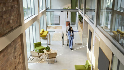 real estate agent in office lobby