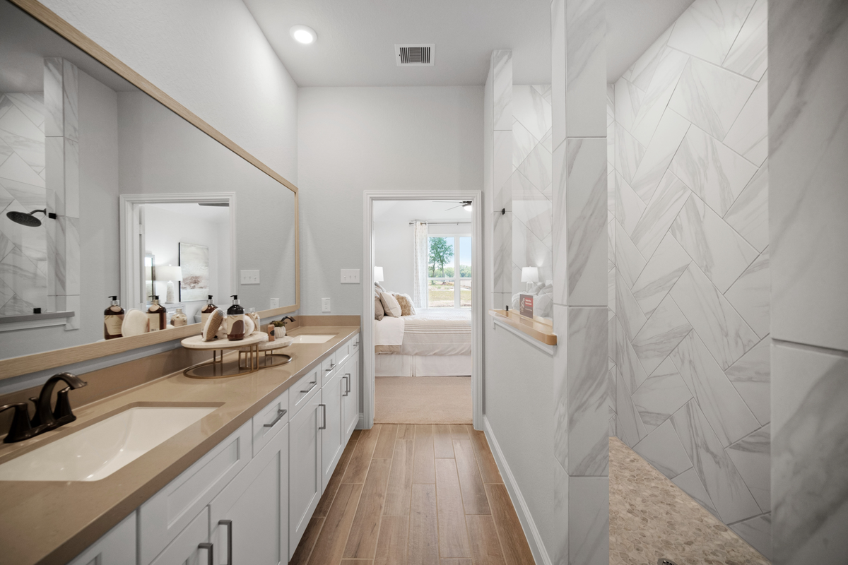 primary bathroom with super shower and tile floor