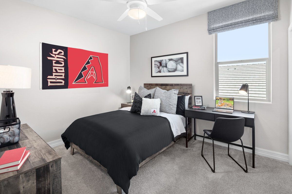hall bedroom with window and bed