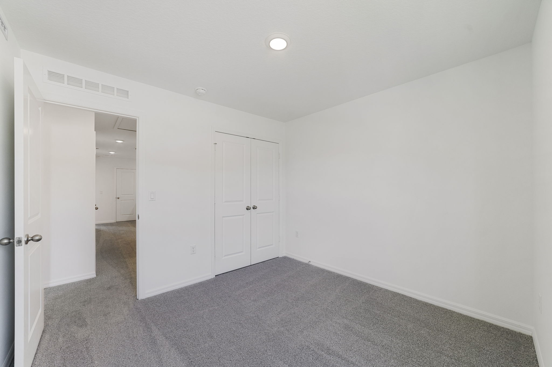 carpet throughout, single window and closet