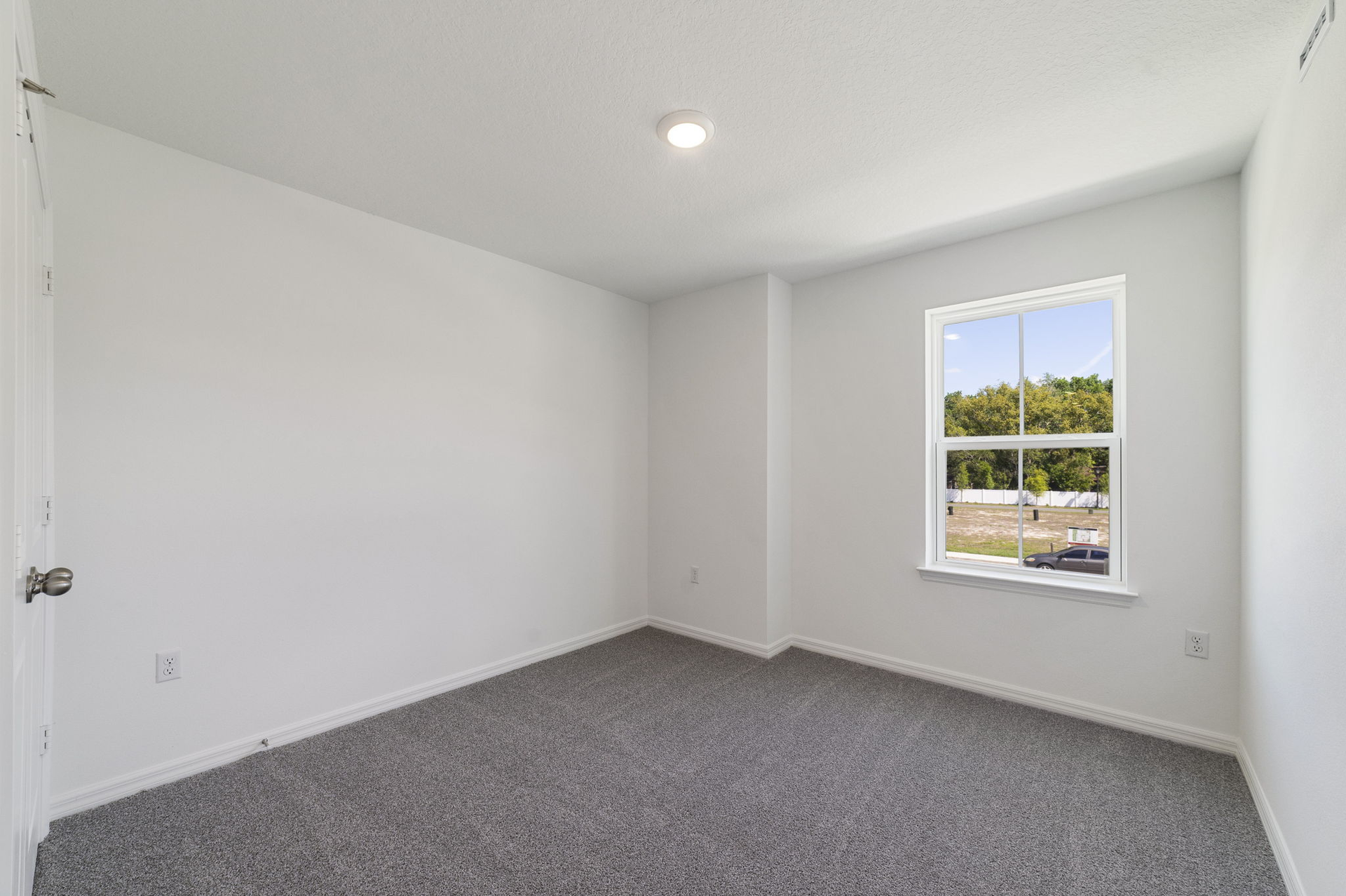 carpet throughout, single window and closet