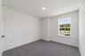 carpet throughout, single window and closet