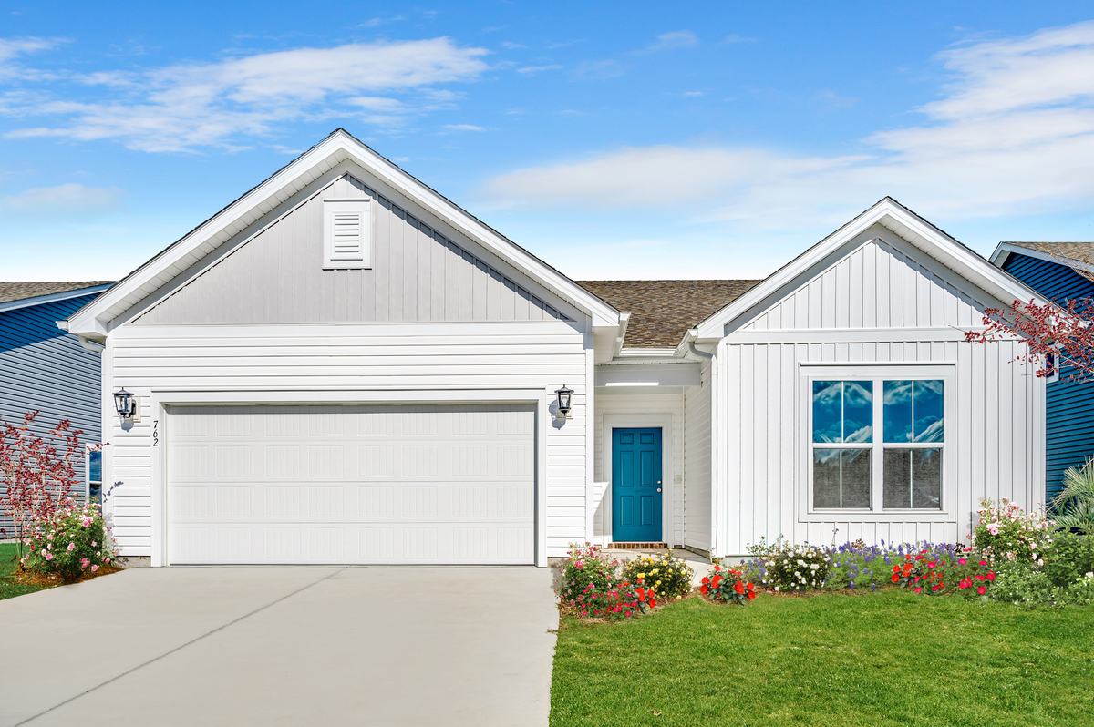 white vinyl siding with blue front door