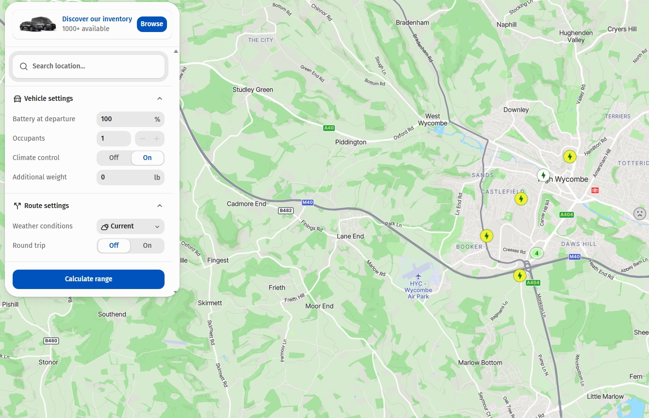 EV range calculator map around High Wycombe showing nearby charging points, with a side panel for vehicle settings like battery percentage, weather conditions, and round trip toggle, and a “Calculate range” button.