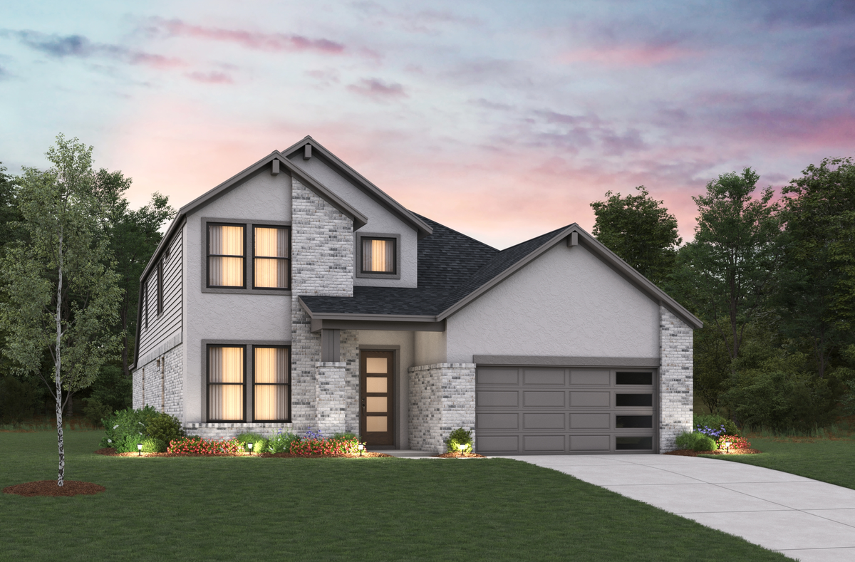 Two-story home with brick dusk sky