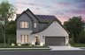 front of 2-story home with 2-car garage and solar panels