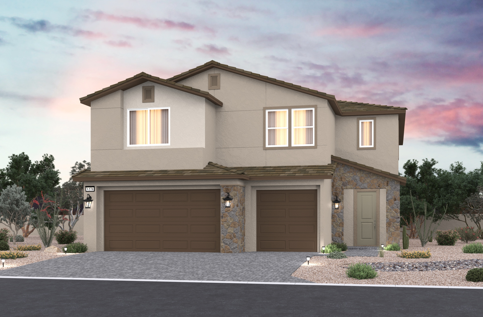 exterior with three-car garage and stone entrance