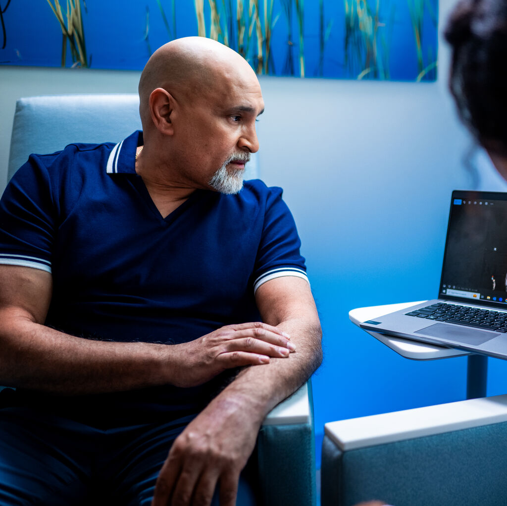 patient and doctor looking at monitor