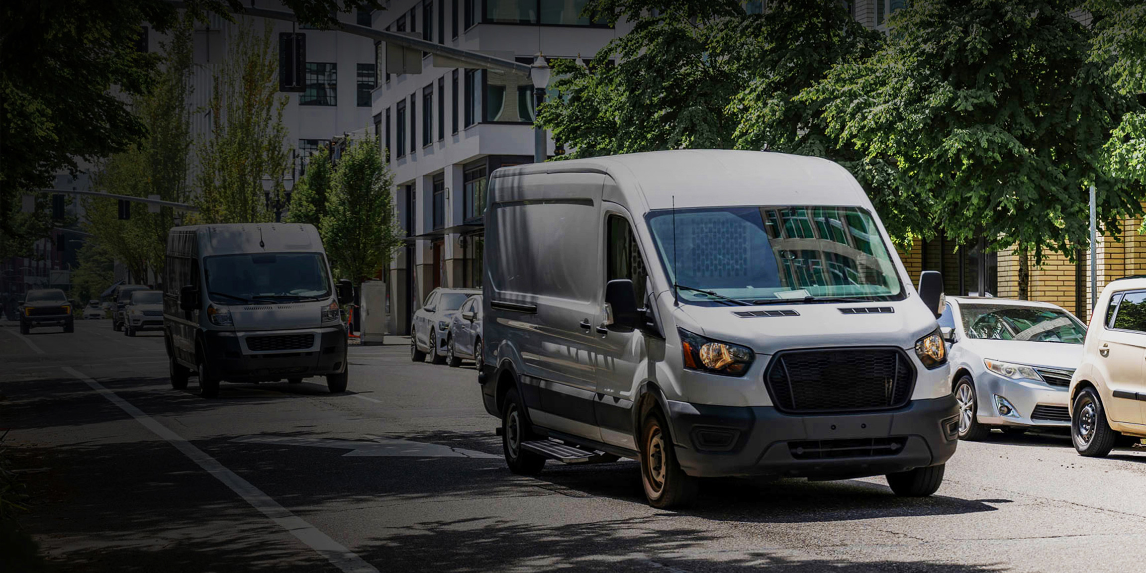 White truck with onboard Fathom e-power system on a city street