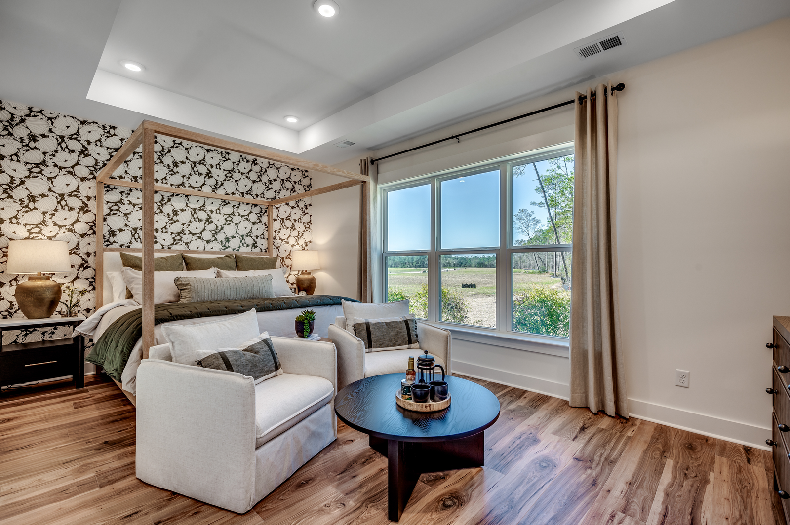 bright room with bed and accent wall
