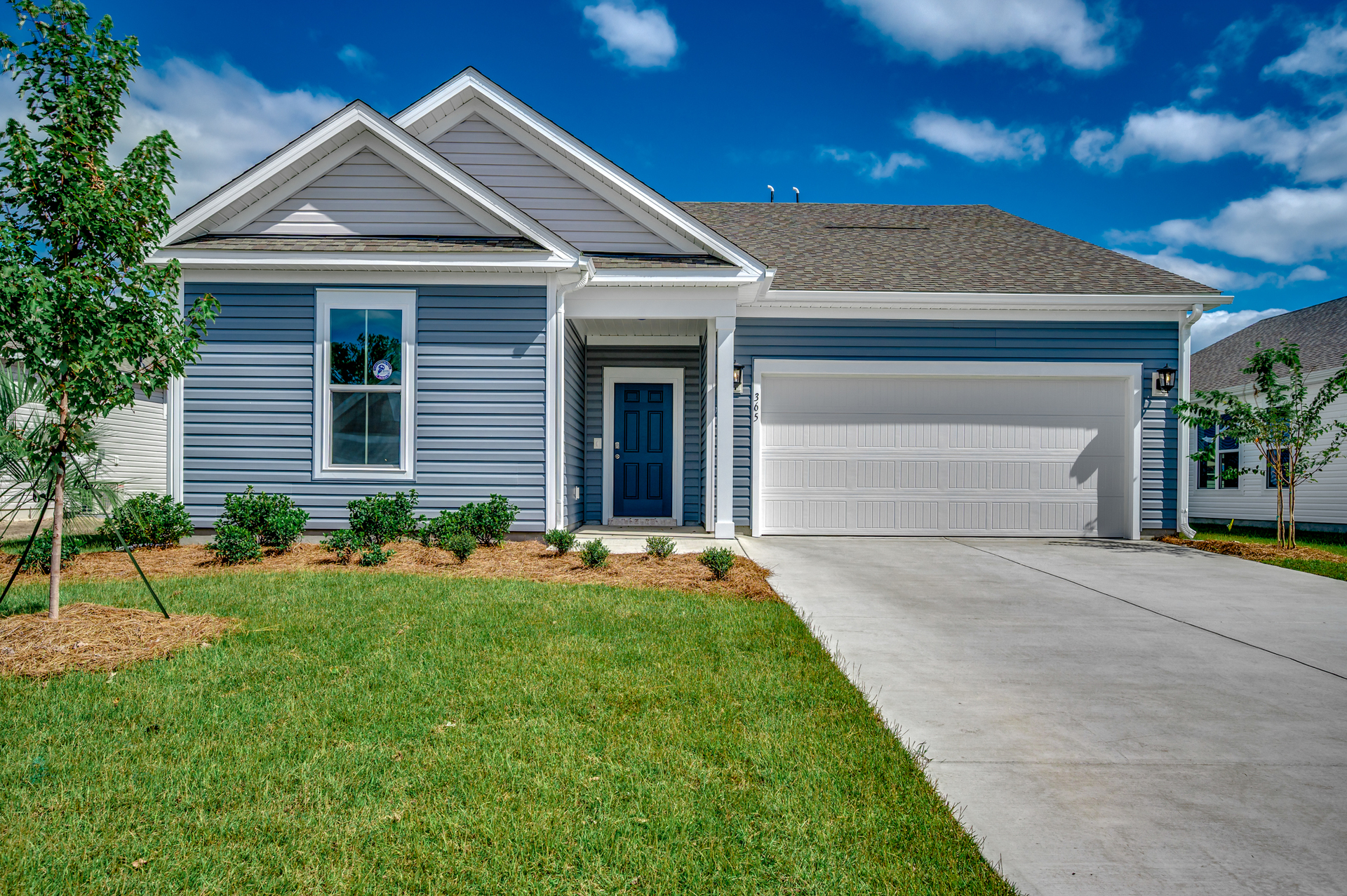 blue vinyl exterior with white trim