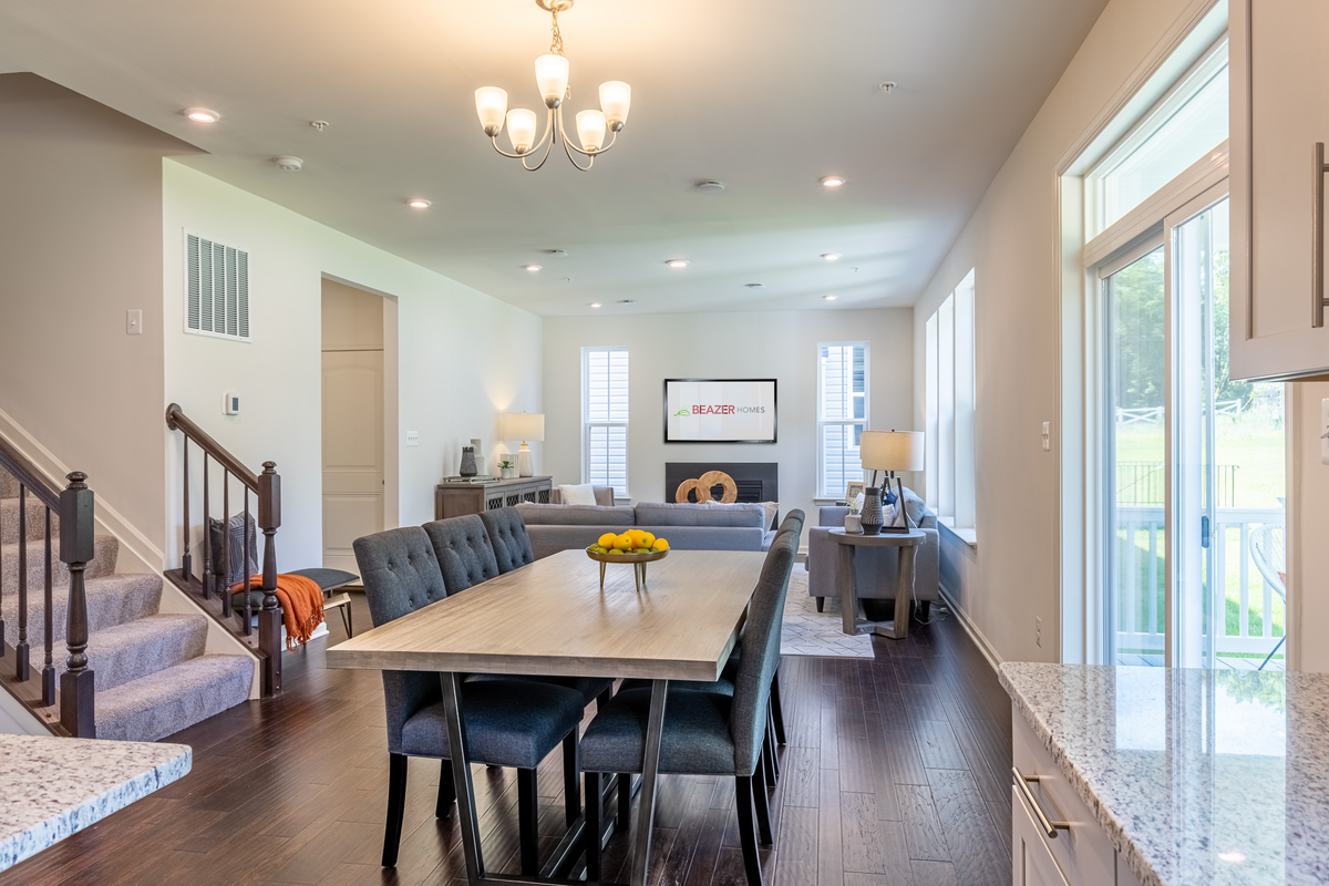 breakfast area with a table and great room