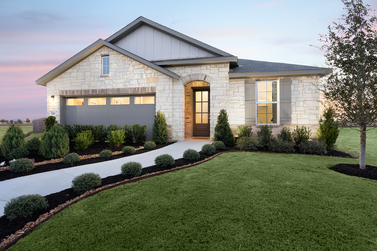 1-story home exterior with brick and stone masonry