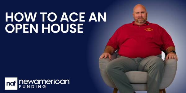 Man in a red shirt sitting in a chair