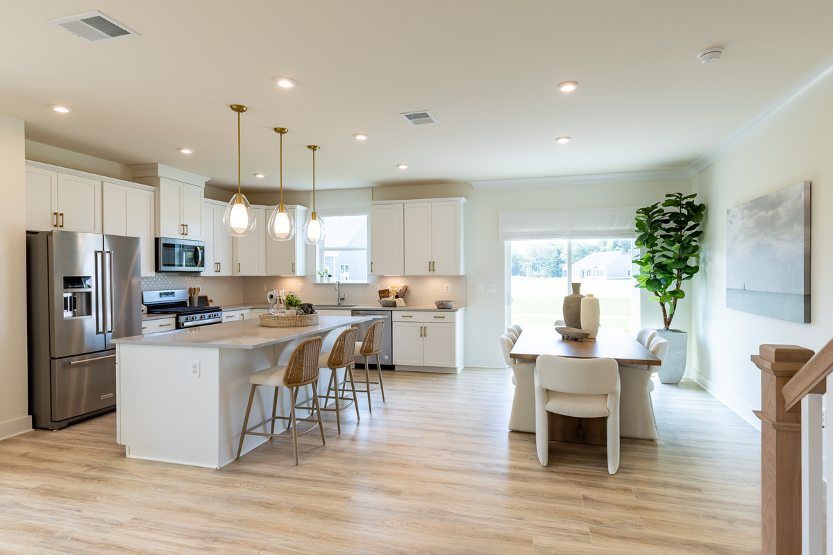kitchen and dining area with designer flooring