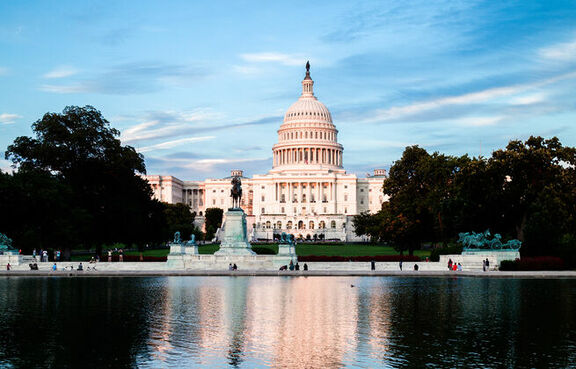 U.S. Capitol Building reflecting in water 
