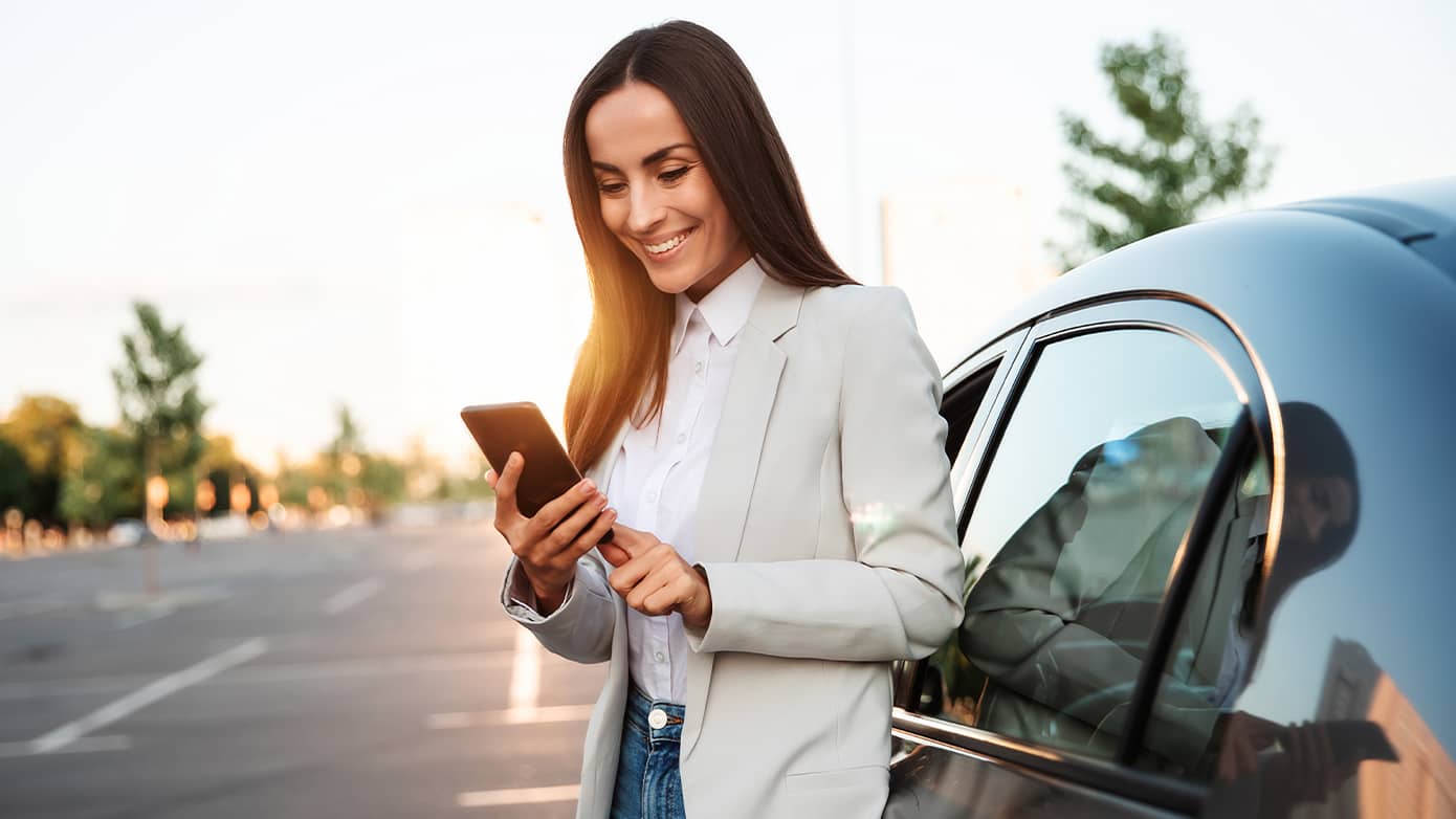 Female looking at an online order status on her cell phone