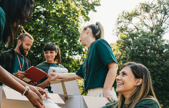 Volunteers working together for a food drive