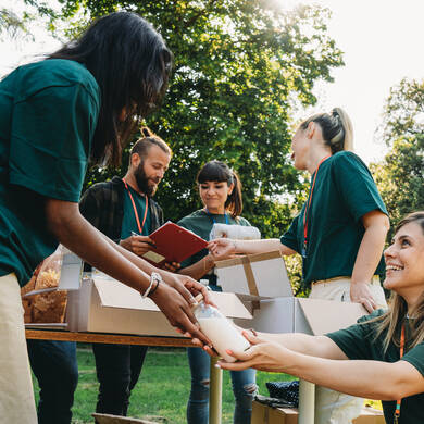 Volunteers working together for a food drive