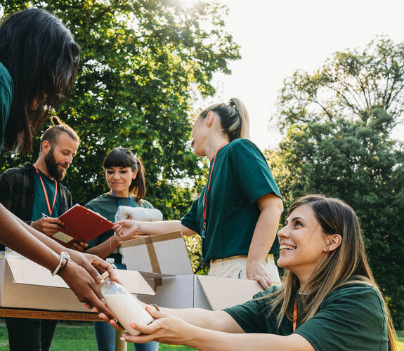 Volunteers working together for a food drive