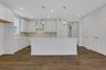 kitchen with white cabinets and quartz counters