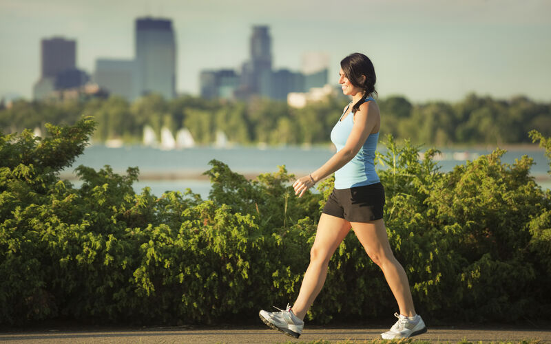 Women power walking in park 