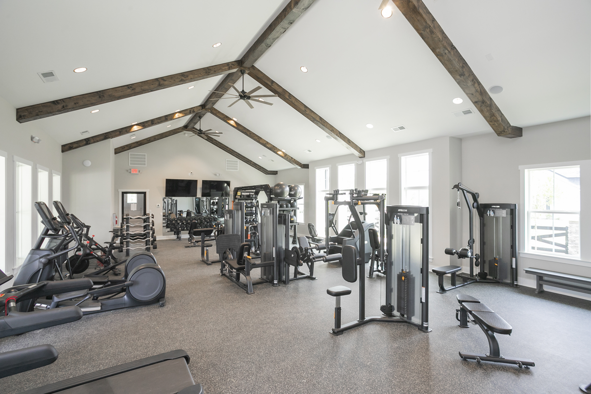 equipment room with workout machines and weights