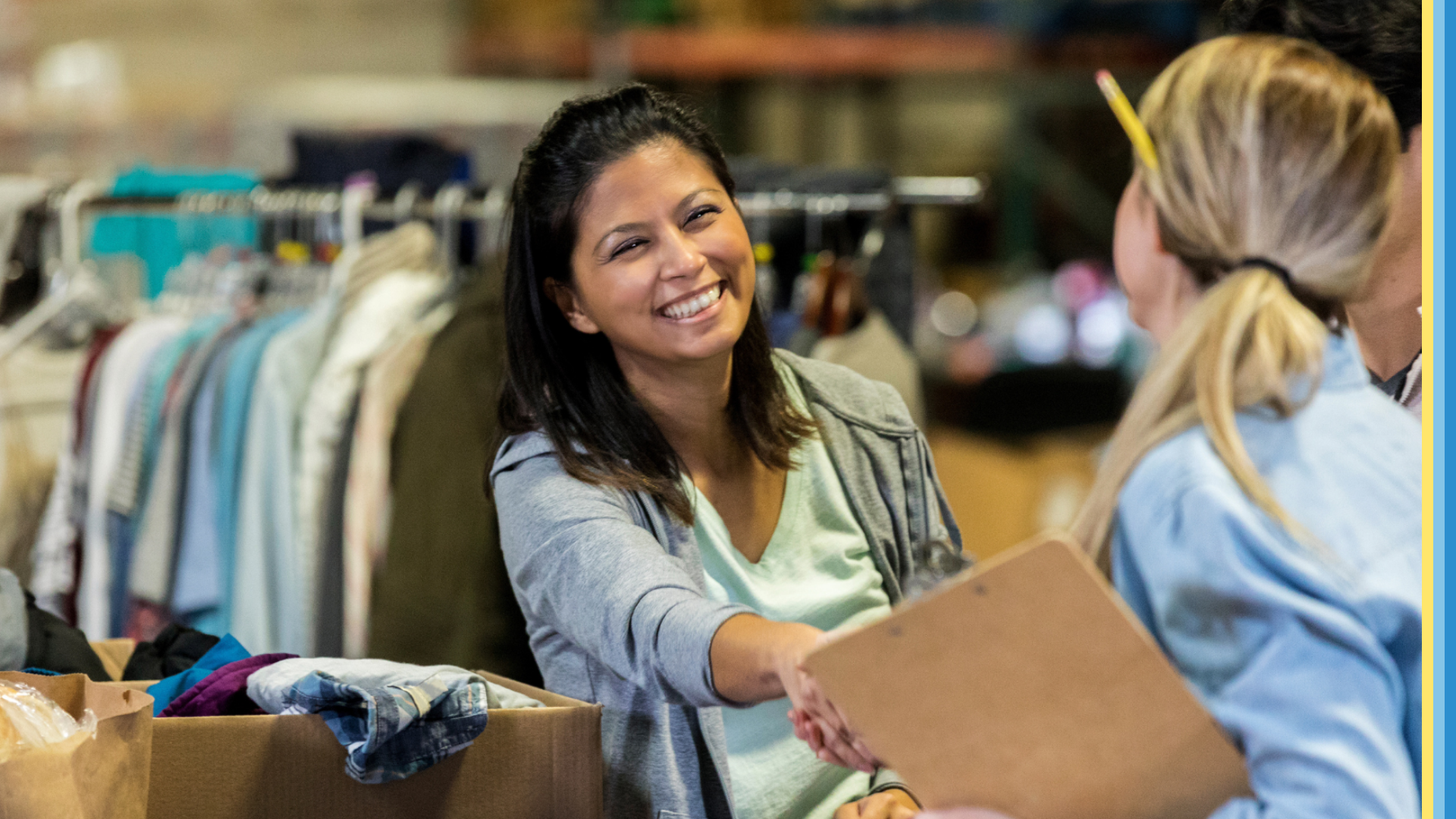 Women smiling and shaking hand with a shop assistant