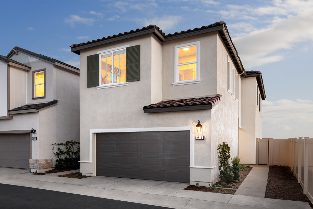 exterior of two-story home with two car garage