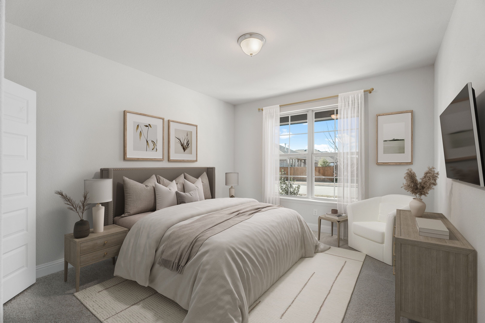 secondary bedroom with carpet flooring, bed, nightstand, a dresser, and large windows
