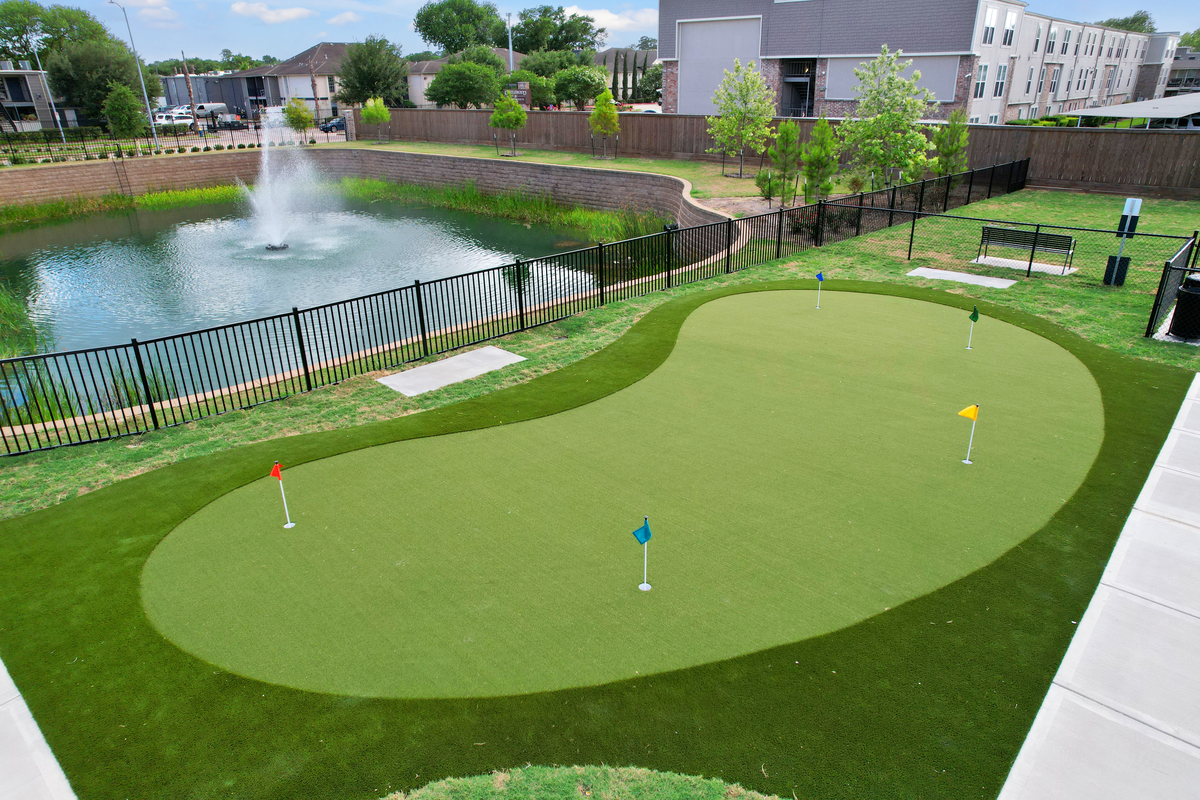 putting green overlooking the water fountain