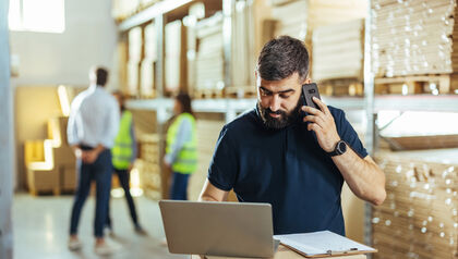 Working at the Warehouse with a laptop