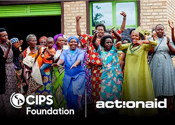 A group of smiling and jubilant women raising their fists and hands in the air outdoors. The CIPS Foundation and ActionAid logos are shown at the bottom.